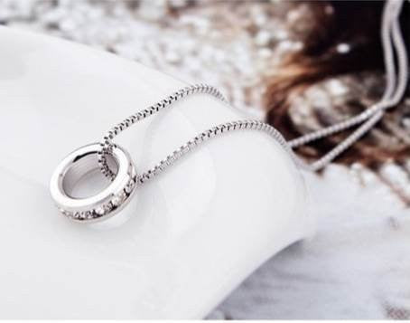 Pop Fashion Silvertone Crystal Studded Ring Pendant Necklace on Silvertone Chain - Pop Fashion